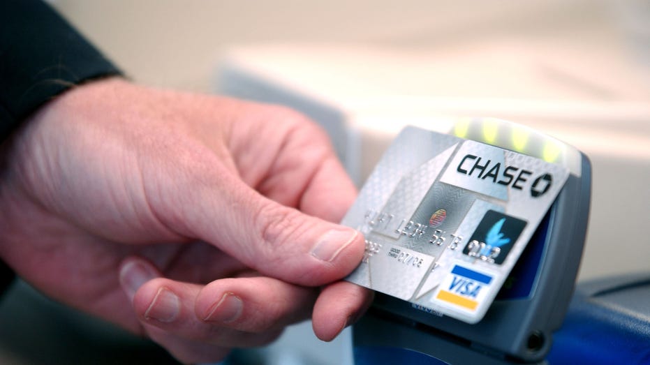Chase Bank credit card with "blink" technology is displayed during a press conference at an Arby's restaurant on June 8, 2005 in Denver, Colo.
