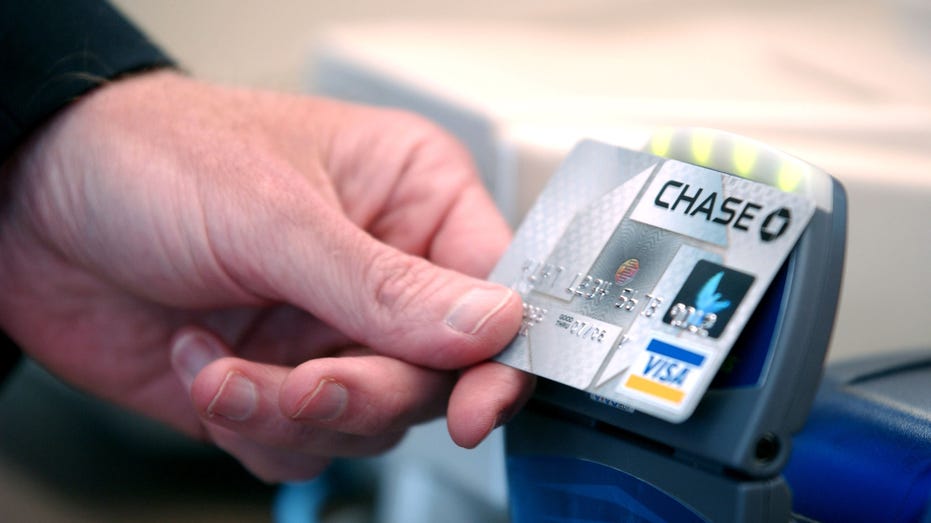 Chase Bank credit card with "blink" technology is displayed during a press conference at an Arby's restaurant on June 8, 2005 in Denver, Colo.