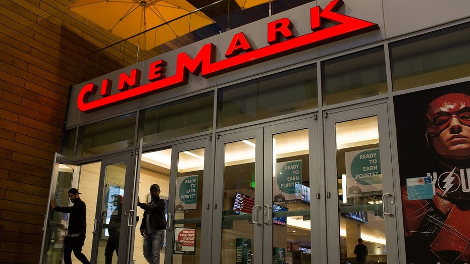 A person exits a Cinemark theater
