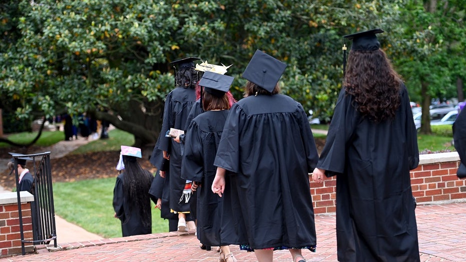 college graduates walking away