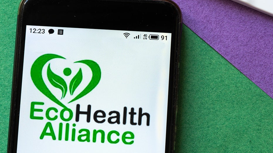 The EcoHealth Alliance logo on a mobile phone