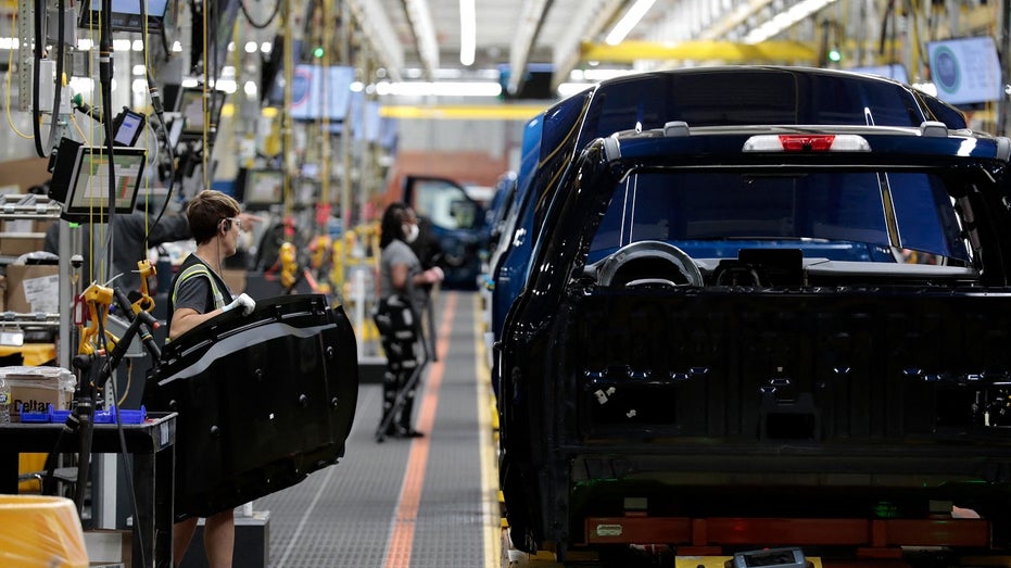 auto workers in Detroit Ford plant