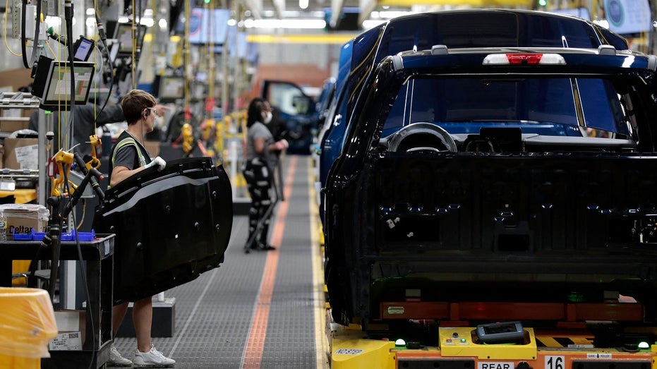 auto workers in Detroit Ford plant