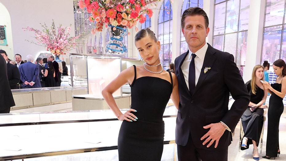 Hailey Bieber and Anthony Ledru are pictured at Tiffany & Co.'s flagship store