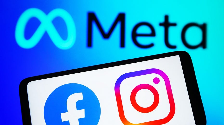 meta logo pinch facebook and instagram logos connected smartphone