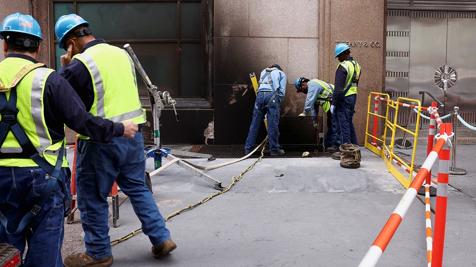 Emergency workers respond to a fire at the Tiffany flagship store in NYC