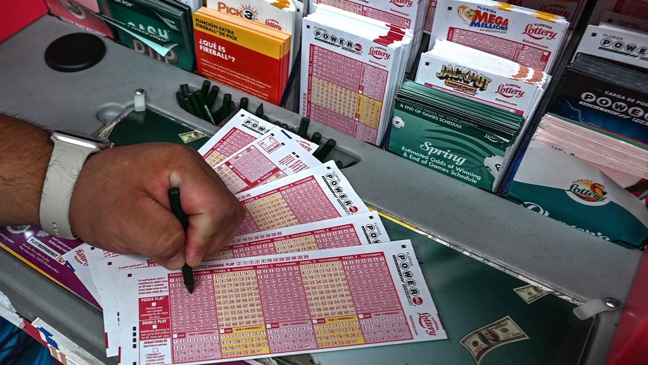 Powerball jackpot climbs to $596M after no tickets match numbers needed to claim grand prize