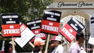 Writers Guild of America reaches tentative agreement with Hollywood studios, suspends picketing