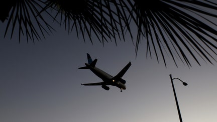 LAS VEGAS, NEVADA - OCTOBER 14: A plane lands at Harry Reid International Airport on October 14, 2022 in Las Vegas, Nevada. Holiday airfare prices are expected to be the most expensive in the last 5 years with Thanksgiving ticket prices up 25 percent from last year with the average round trip ticket price of $281. Christmas travel costs are up 55 percent from last year with round trip ticket prices averaging $435.  - Fox Business News