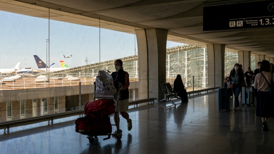 Passengers at Charles de Gaulle airport in Paris, France