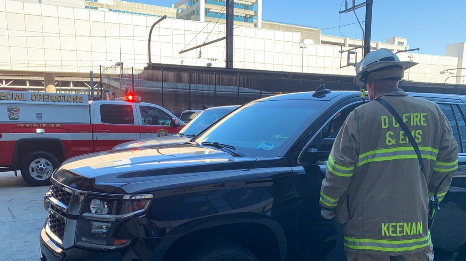 A D.C. firefighter at the scene of the derailment