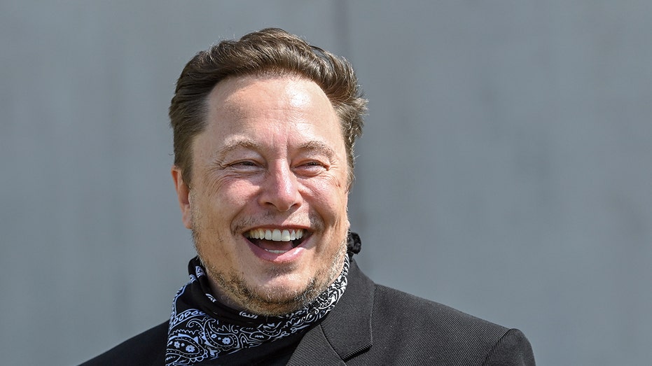 Musk laughing