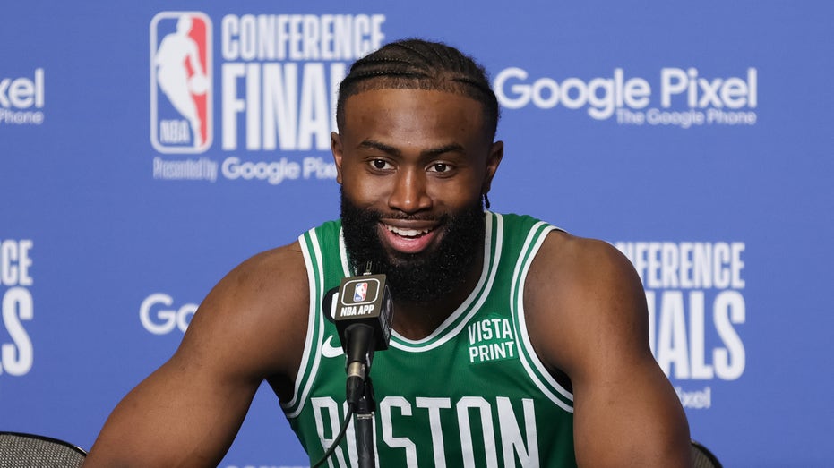 Jaylen Brown speaks at a press conference