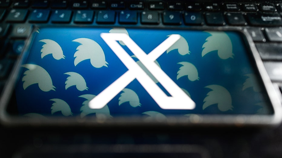 X logo on phone