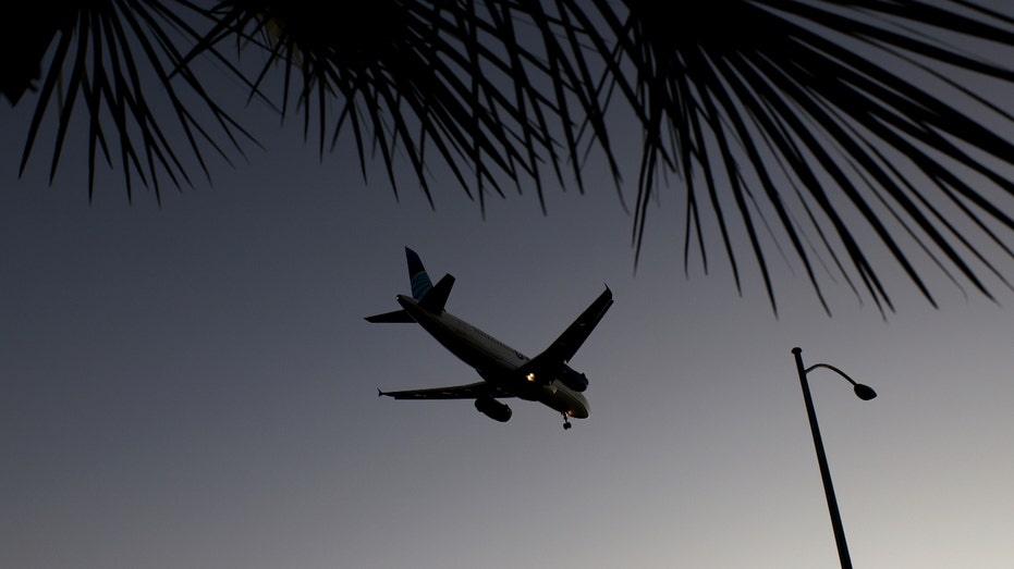 A plane lands at Harry Reid International Airport