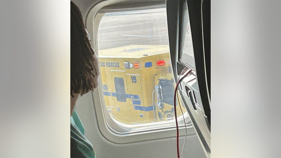 ambulance outside plane