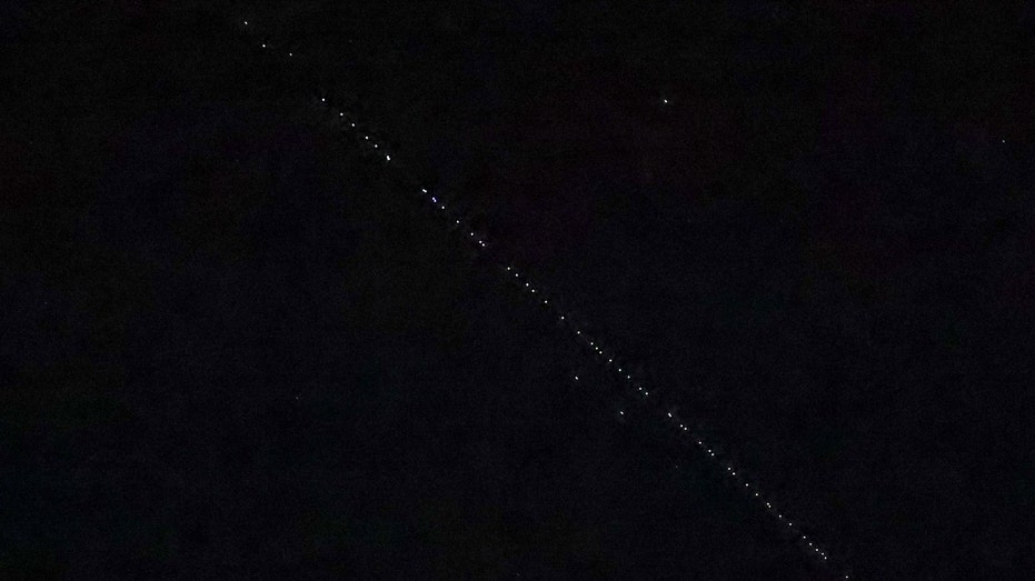 The passage of SpaceX Starlink satellites is observed in Turkey skies