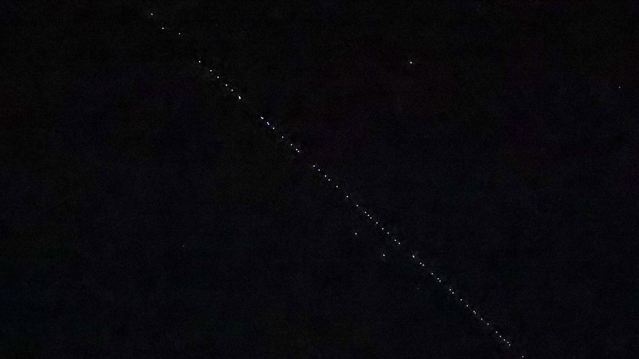 The passage of SpaceX Starlink satellites is observed in Turkey skies