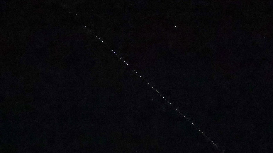 The passage of SpaceX Starlink satellites is observed in Turkey skies