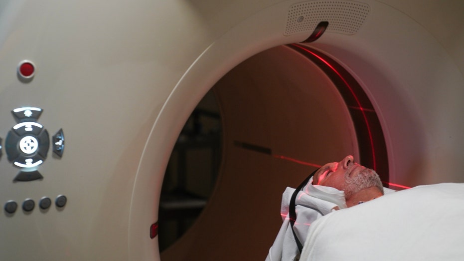A man receives a PET scan