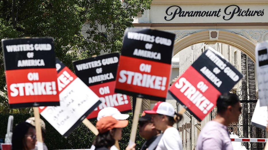 Writers Guild members striking in front of Paramount