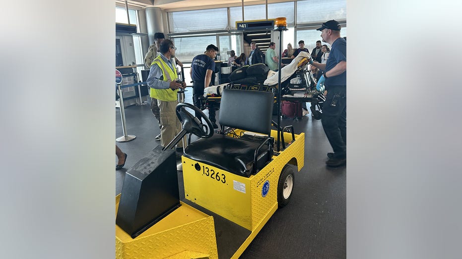 gurney at airport