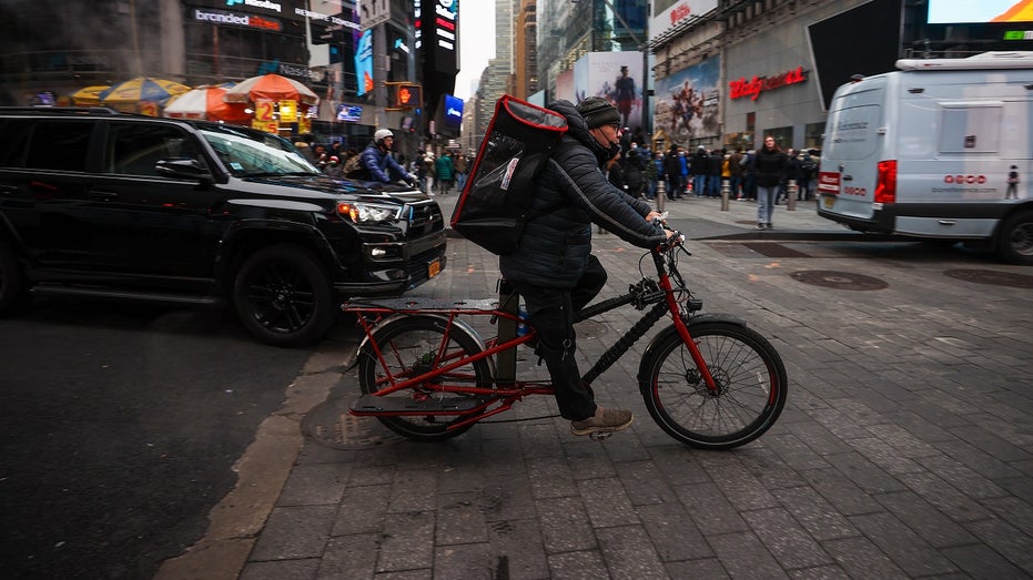 food delivery worker bikes in NYC