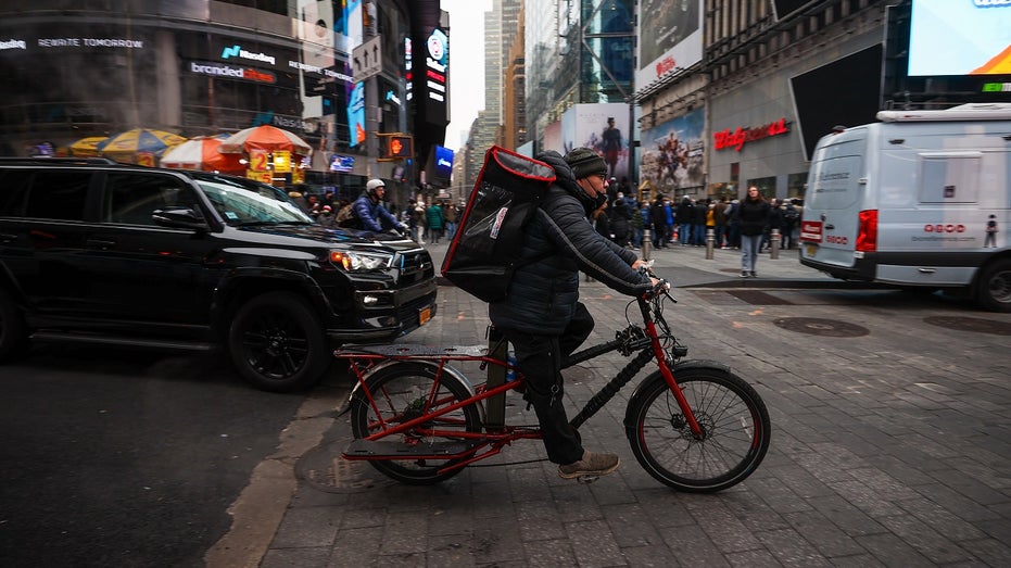 food delivery worker bikes in NYC