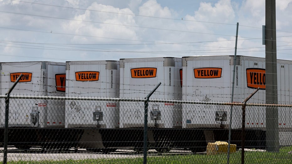 yellow corp trucks lined up