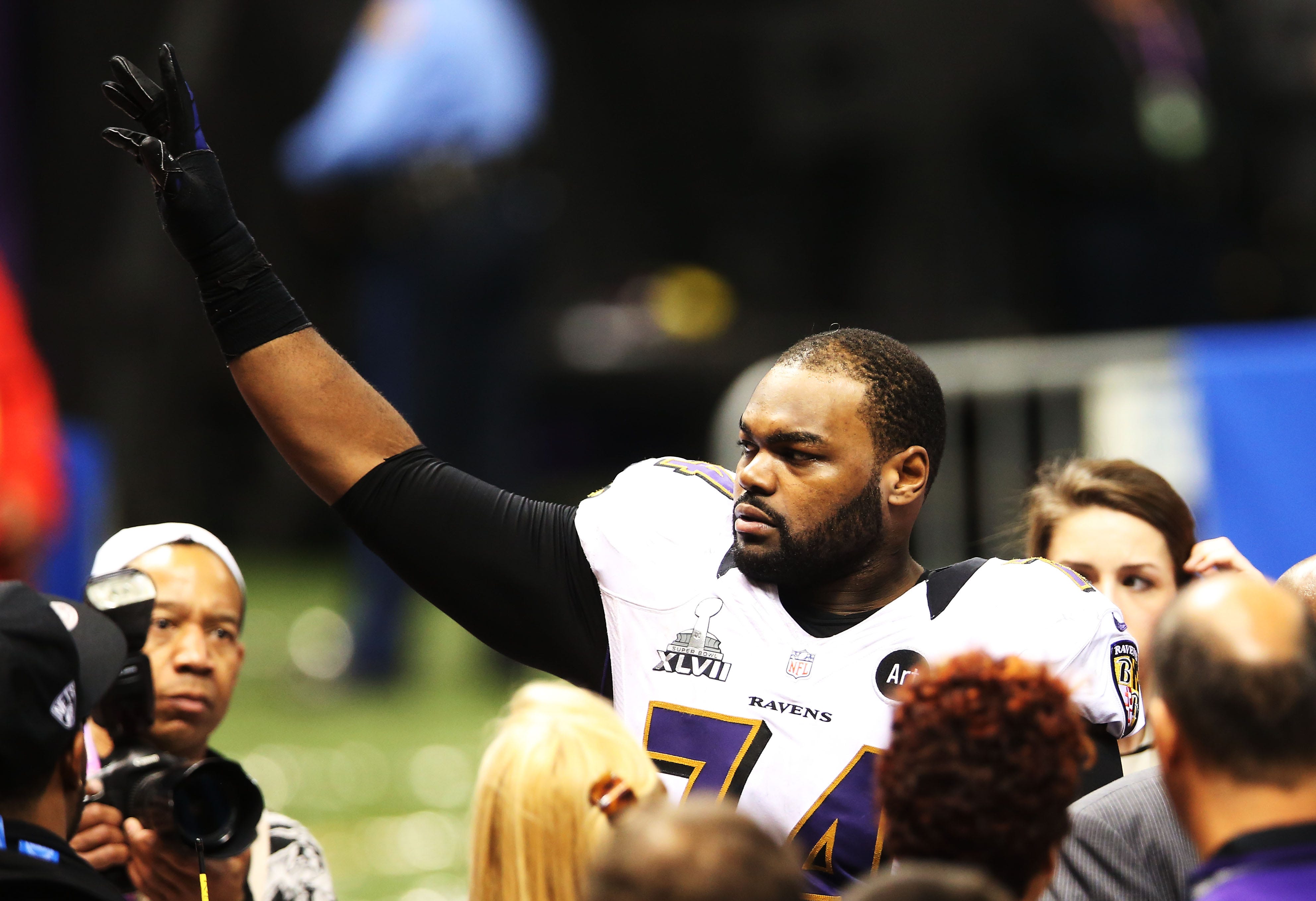 Feb 3, 2013; New Orleans, LA, USA; Baltimore Ravens tackle Michael Oher (74) celebrates after defeating the San Francisco 49ers 34-31 in Super Bowl XLVII at the Mercedes-Benz Superdome.Mandatory Credit: Matthew Emmons-USA TODAY Sports (NFL)