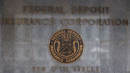 Logos are seen on the outside of the Federal Deposit Insurance Corp. (FDIC) building on March 13, 2023 in Washington, DC.