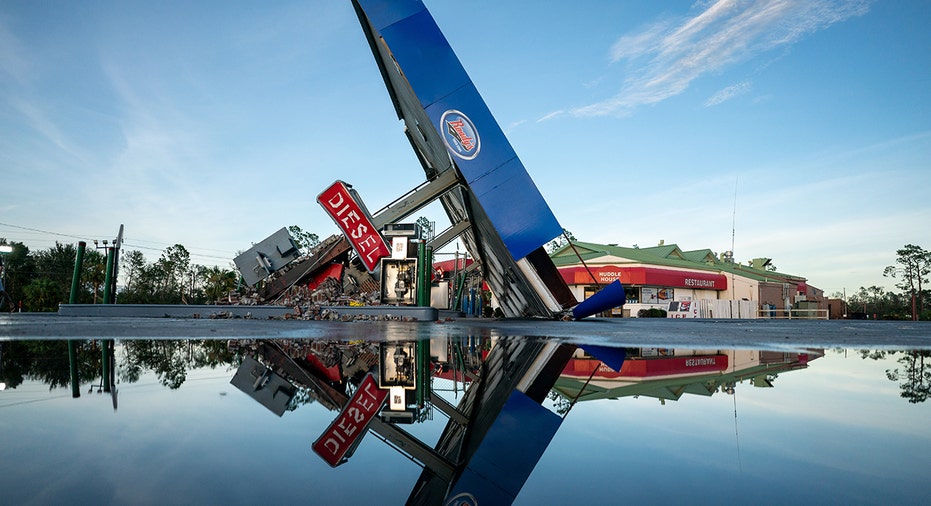 A photo of a destroyed gas station