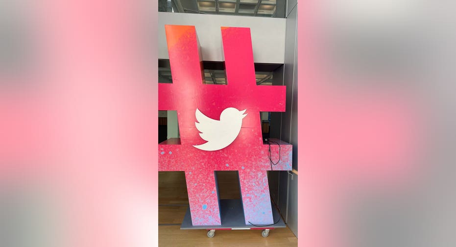 Items depicting various Twitter logos being prepared for an auction