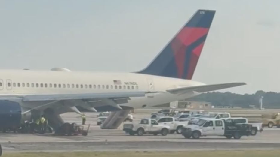 Delta plane's slides deployed after landing in Atlanta