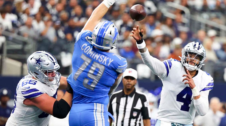 Dak Prescott passes during a game