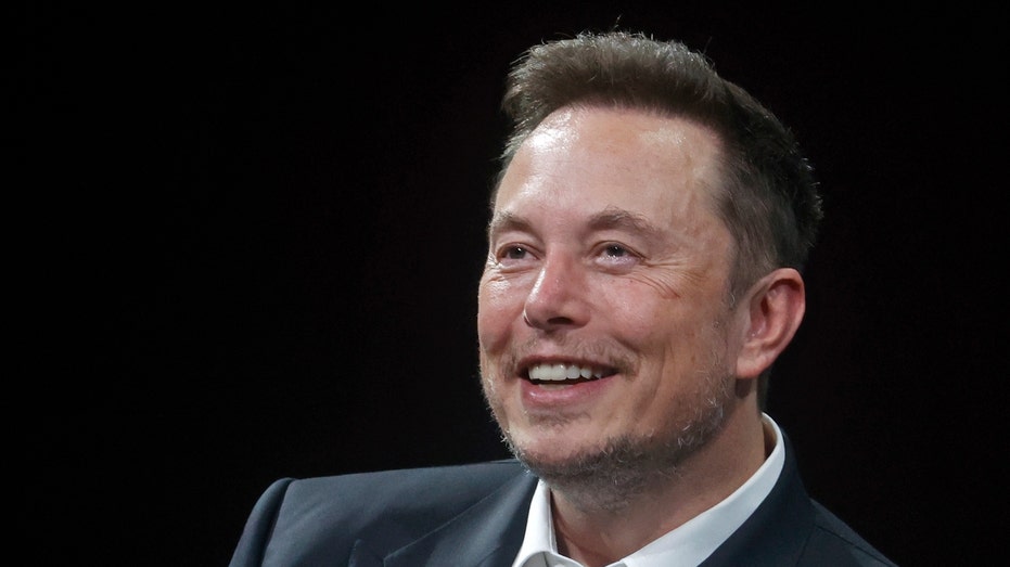 Elon Musk smiling