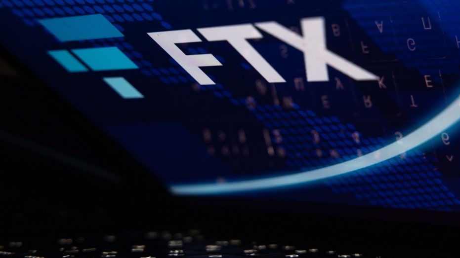 The FTX Cryptocurrency Derivatives Exchange logo on a laptop screen 