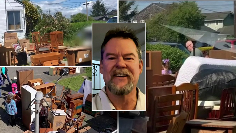 Man in front of squatters belongings