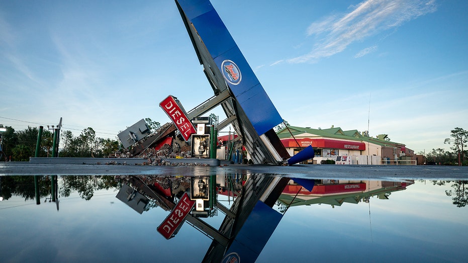 A photo of a destroyed gas station