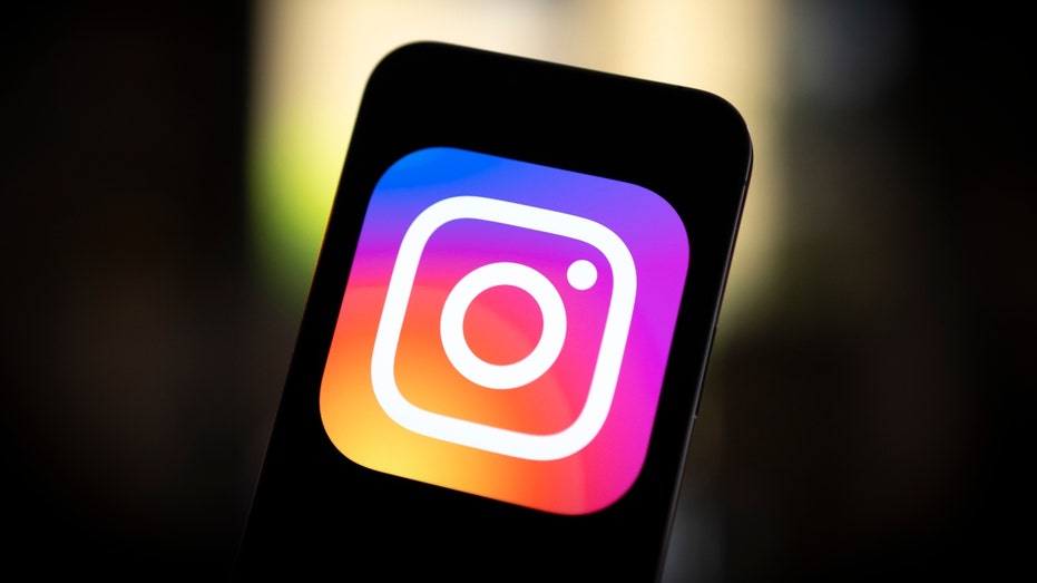 The Instagram logo is seen on a mobile device 