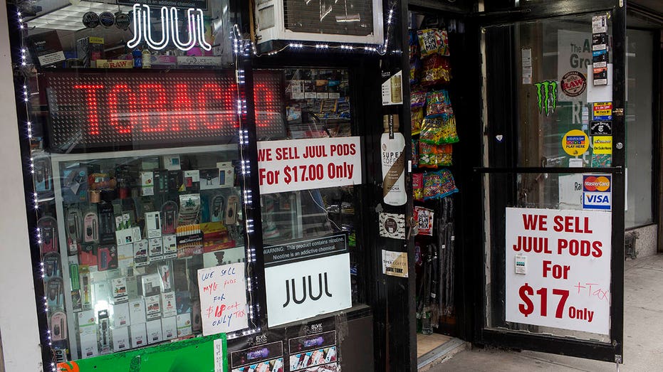 Vape signs on shop door