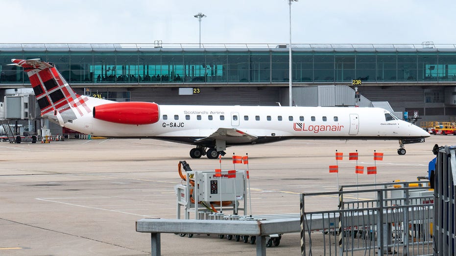 Loganair plane in London, UK