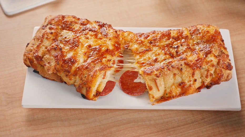 Domino’s debuts new pepperoni-stuffed cheesy bread in all US stores ...