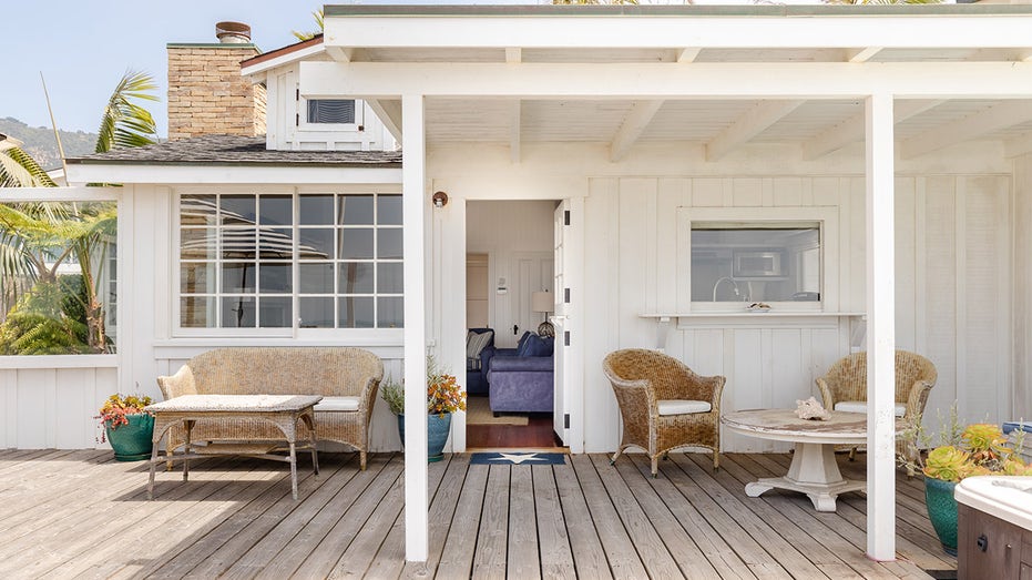 view of the patio with door open to living room