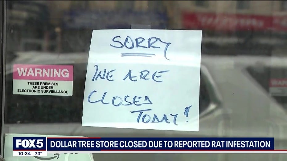 Dollar Tree store with closure sign on glass.