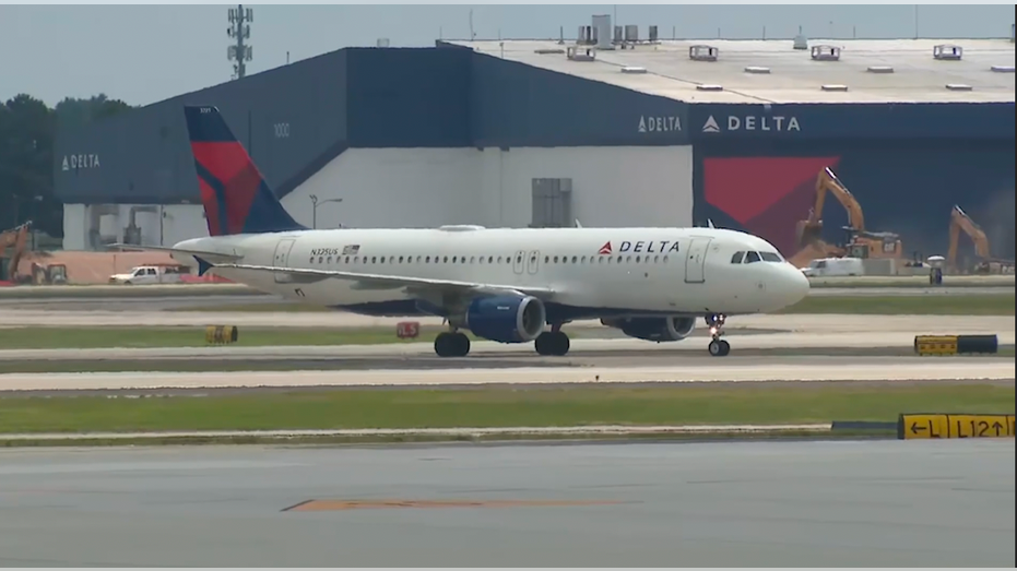 Delta Air Lines plane on the runway