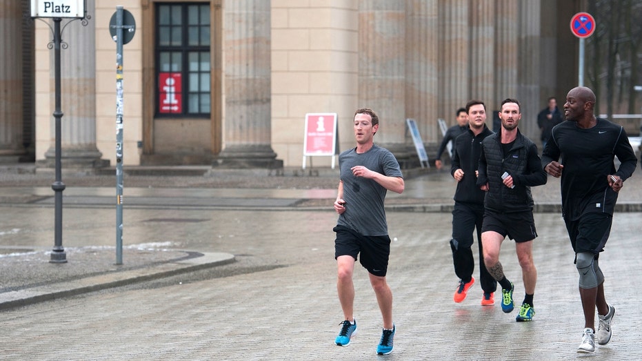 Zuckerberg running in the streets with a group
