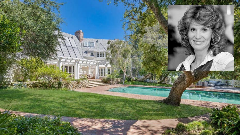 The home and the swimming pool in a split with a photo of Barbara Bosson