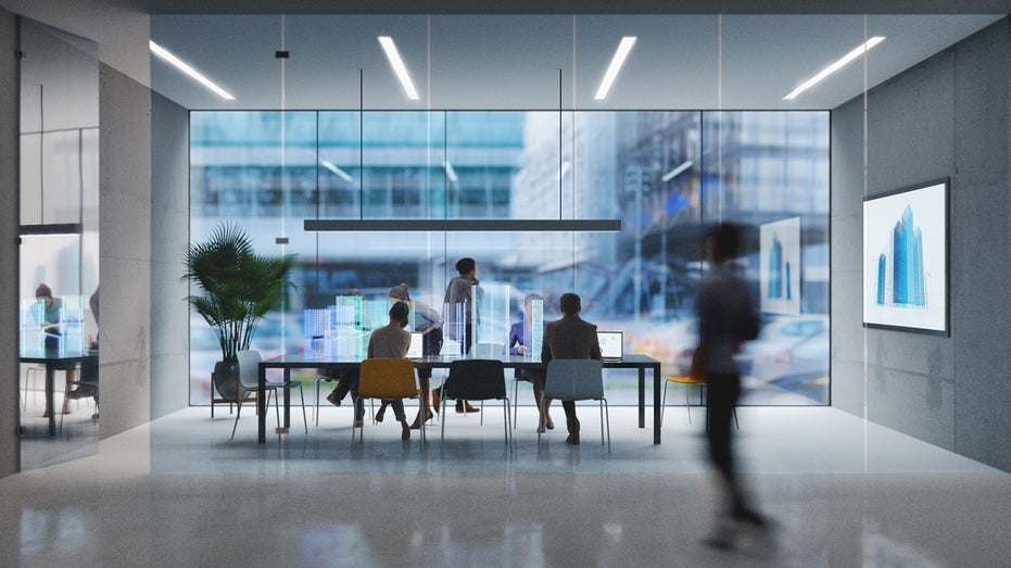 workers in a board room setting