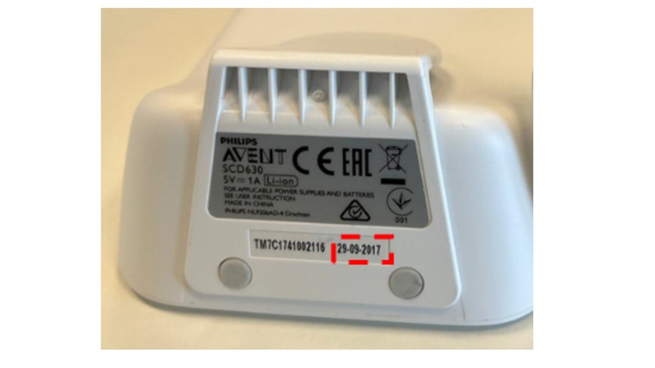 The bottom of a recalled Philips baby monitor